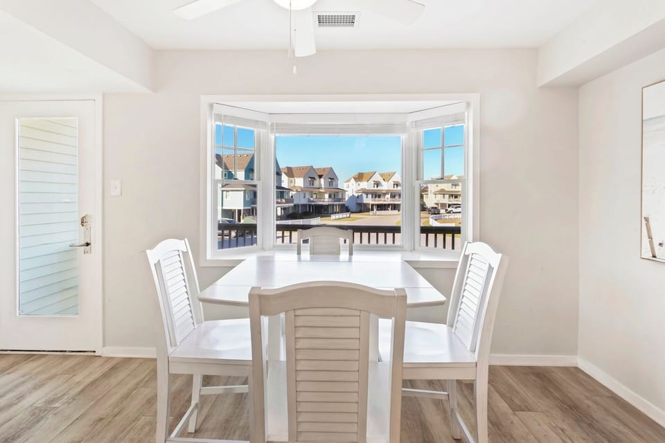 Gather for meals, games, or planning your next beach adventure in the open dining space.