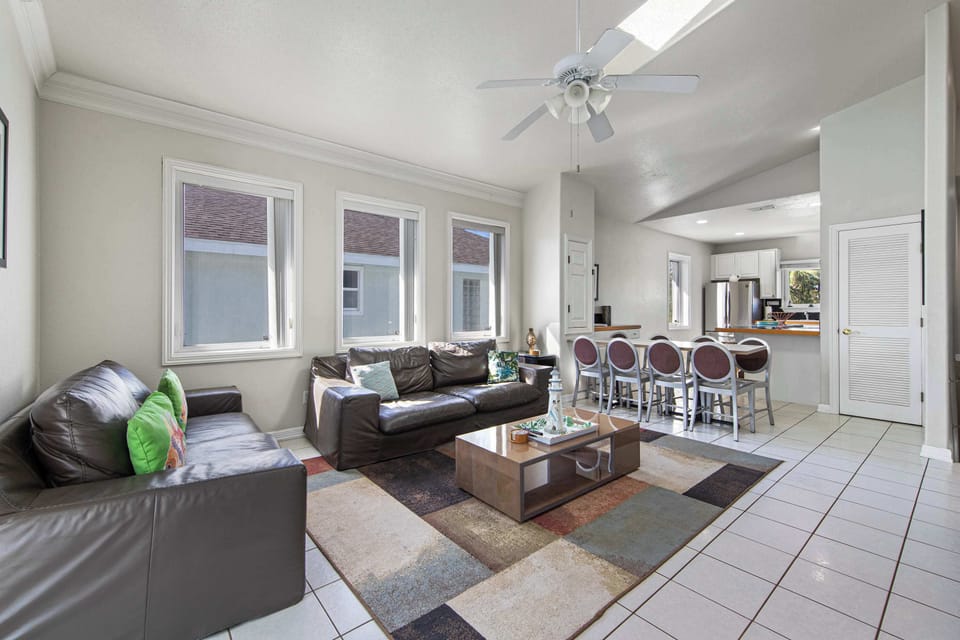 Your own pool and palm-shaded backyard await
