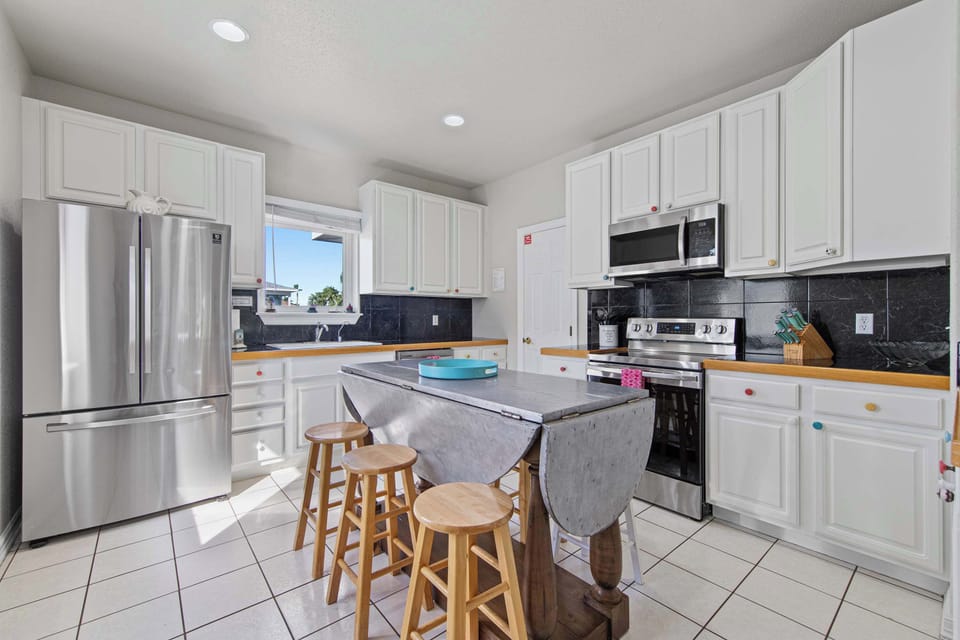 Pull up a stool at the island for casual meals and conversation