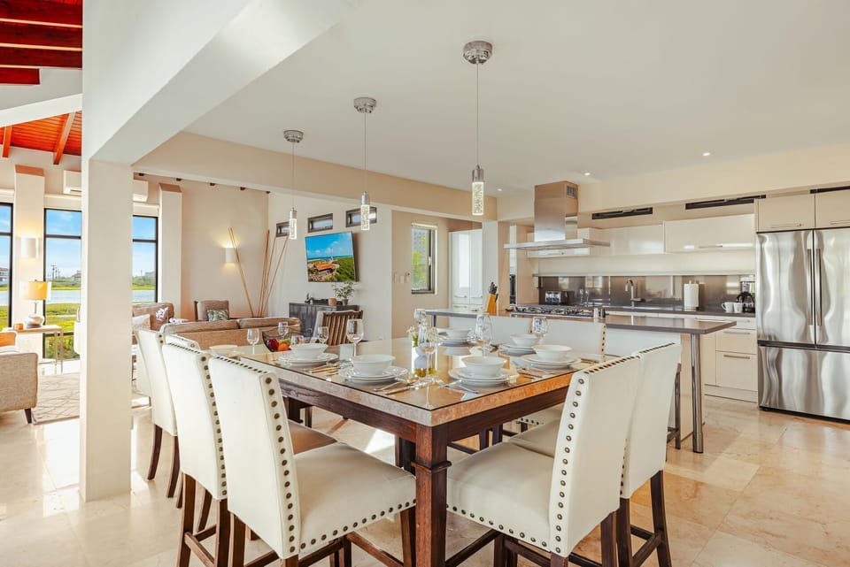 Gather, dine, and make memories! Our elegant, open-concept dining area is perfectly situated between the gourmet kitchen and comfortable living room, making it ideal for shared meals and lively conversation.