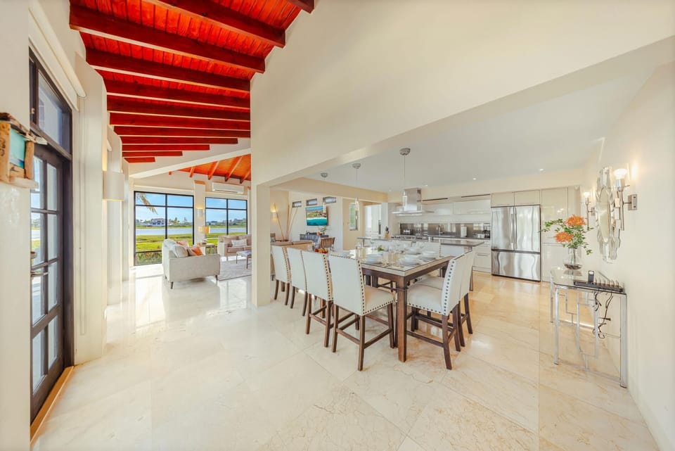 Gather, dine, and make memories! Our elegant, open-concept dining area is perfectly situated between the gourmet kitchen and comfortable living room, making it ideal for shared meals and lively conversation.