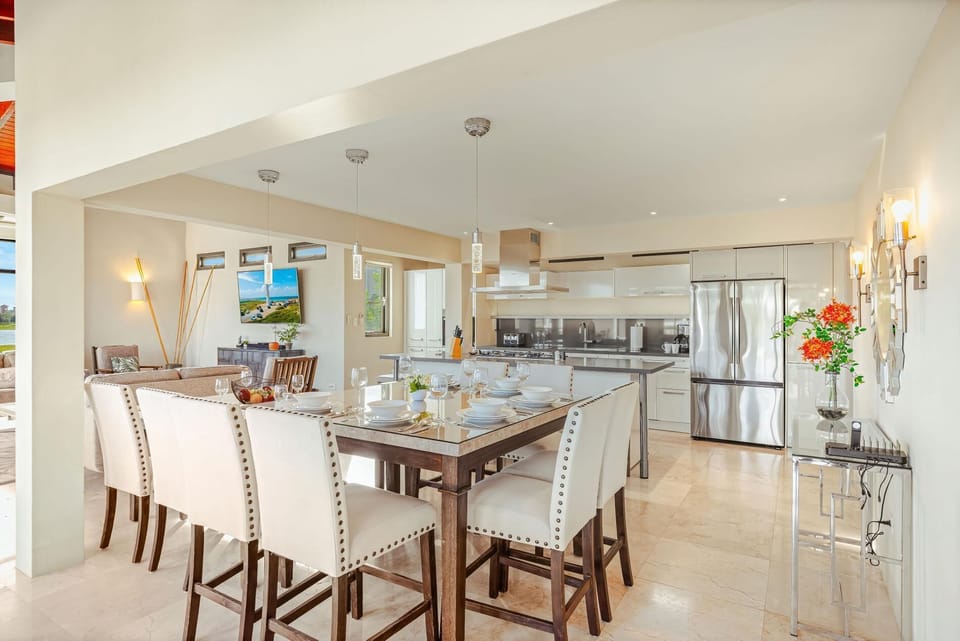 Gather, dine, and make memories! Our elegant, open-concept dining area is perfectly situated between the gourmet kitchen and comfortable living room, making it ideal for shared meals and lively conversation.