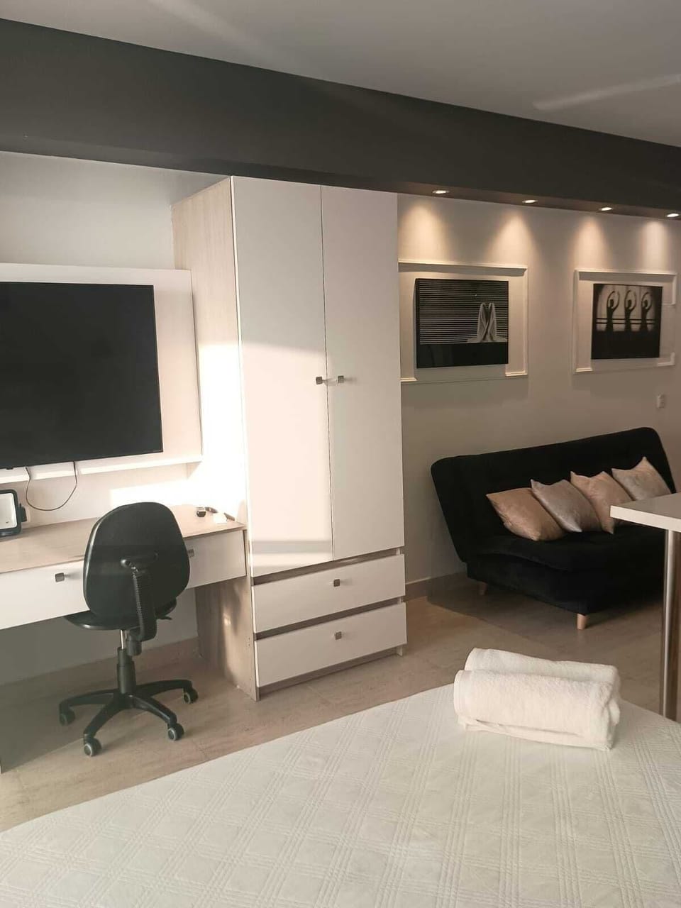 Laptop workspace, blackout drapes, soundproofing, iron/ironing board