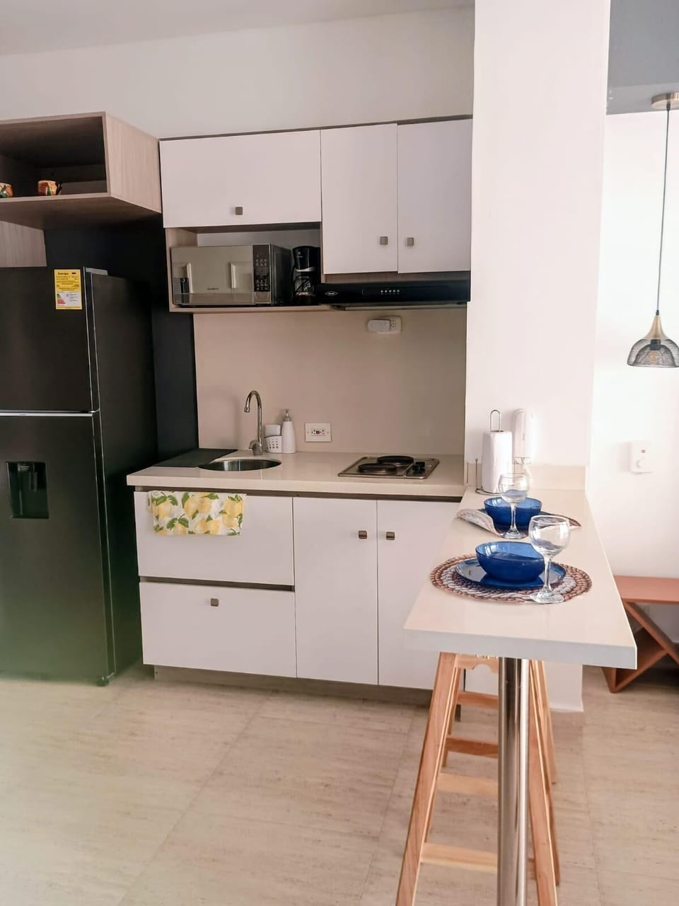 Comfort Quadruple Room, Beach View | Private kitchen | Fridge, microwave, cookware/dishes/utensils