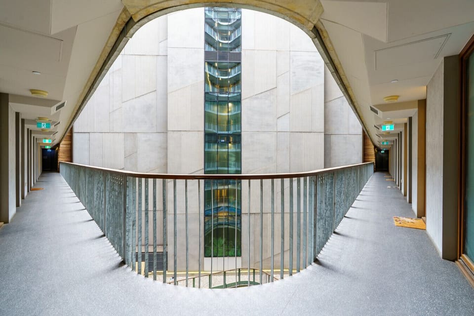 Wander through symmetry and light in this modern architectural gem