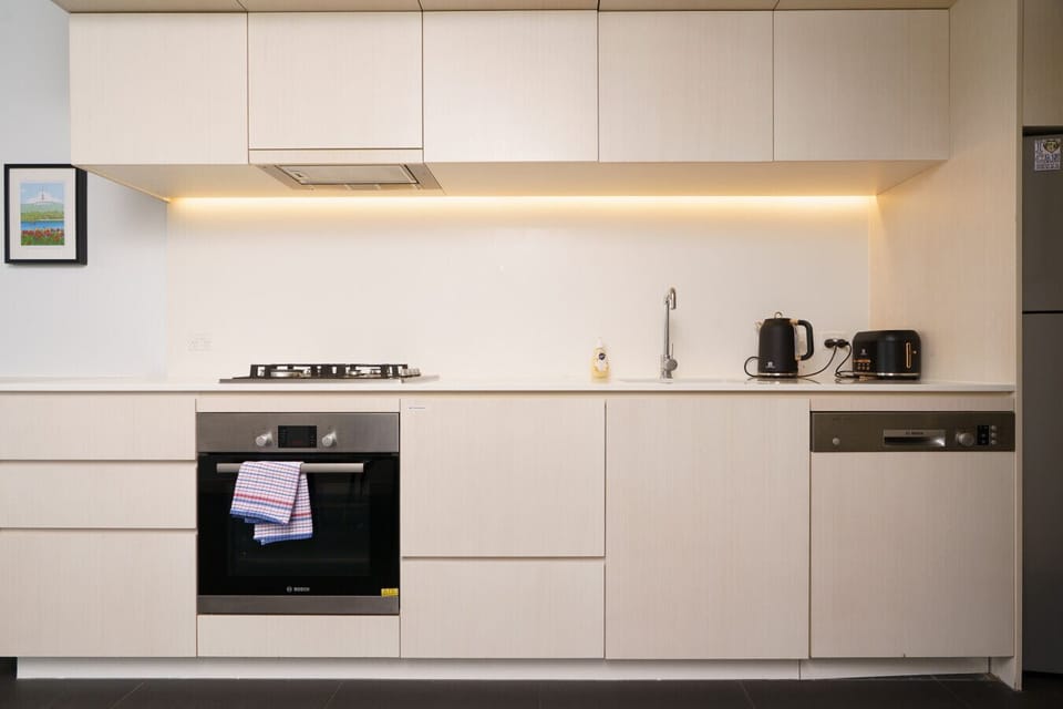 Cook with ease in a sleek, minimalist kitchen with modern appliances
