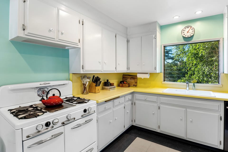 The kitchen features ample counter space and reliable appliances for your convenience.