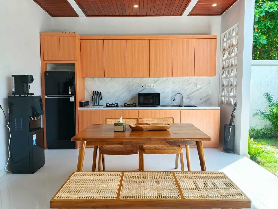 Villa, Non Smoking | Private kitchen | Electric kettle, dining tables