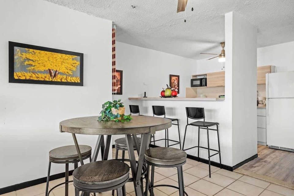 Our kitchen bar area is the ideal spot for casual dining or catching up over a cup of coffee.