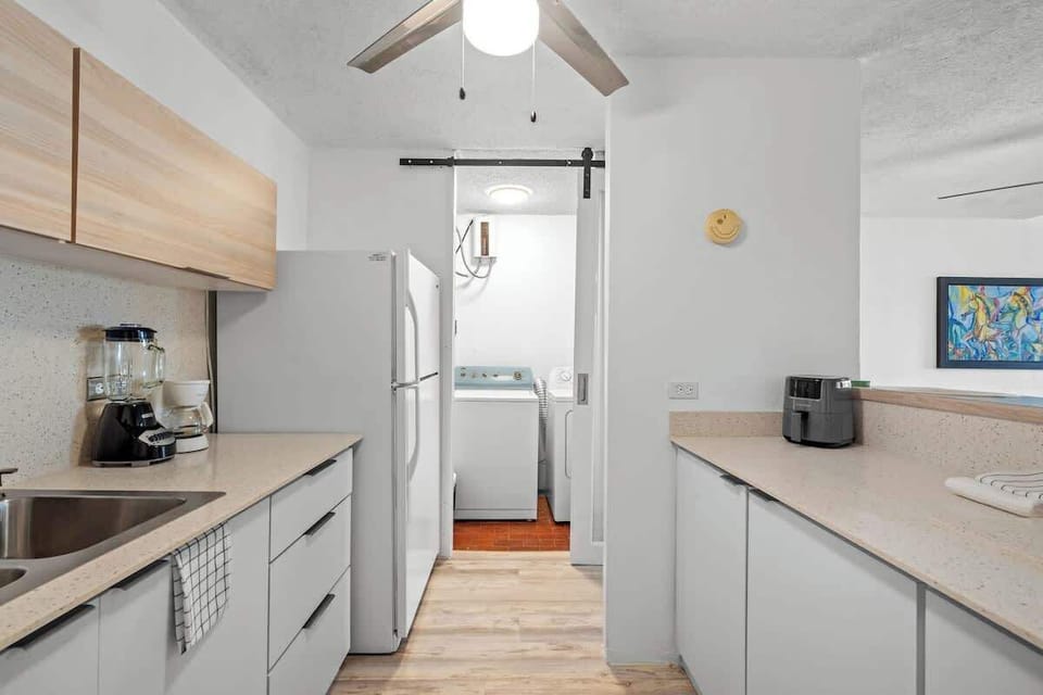 Prepare your favorite dishes in our clean and compact kitchen, designed for both efficiency and comfort.