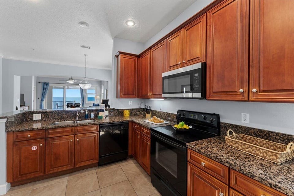 Spacious kitchen with granite countertops, modern appliances, and everything you need to prepare meals with ease.