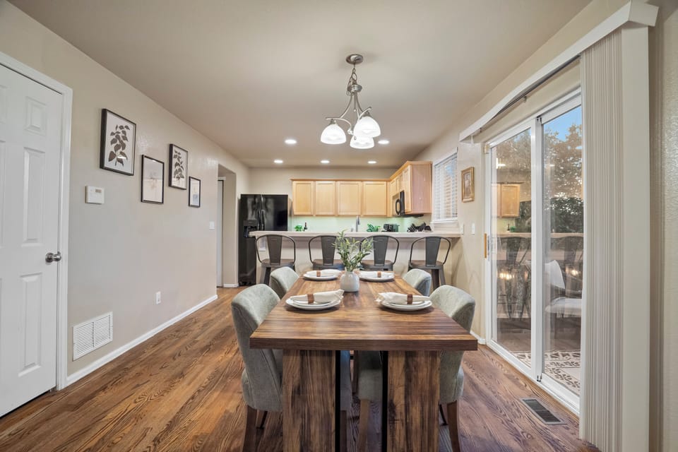 Open-concept layout connects the living room, dining space, and kitchen. Great for gathering and entertaining!