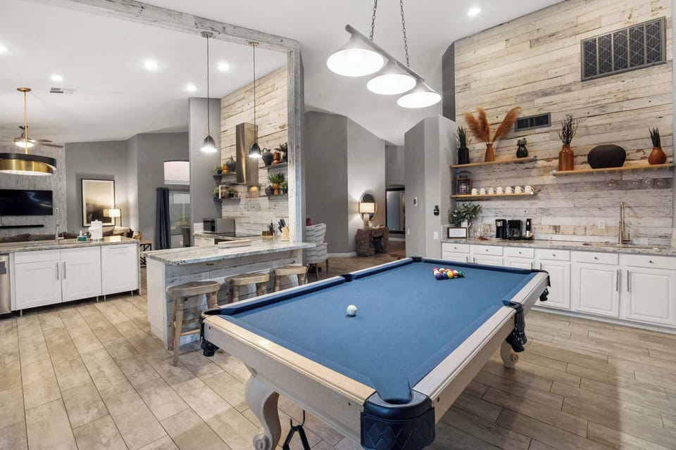 Pool table fun in a modern, open space
