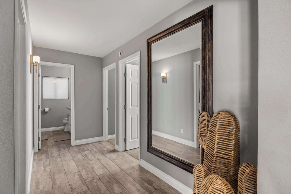 Hallway connecting bedrooms and bath.