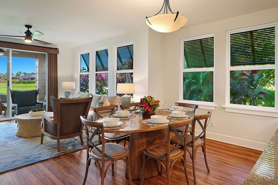 Cozy dining nook bathed in natural light—perfect for shared meals or morning coffee with garden vistas.