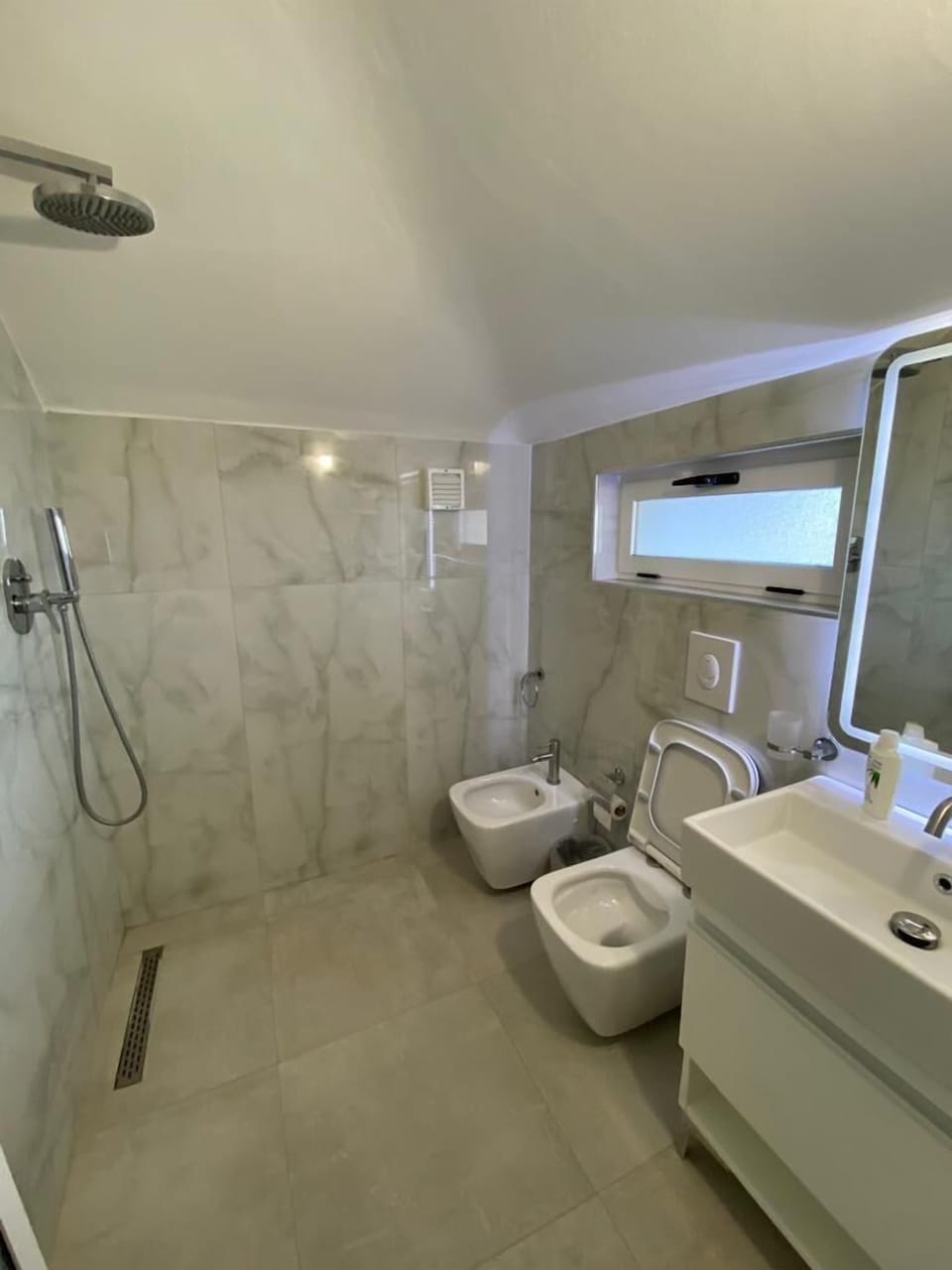 Bathrobes, slippers, bidet