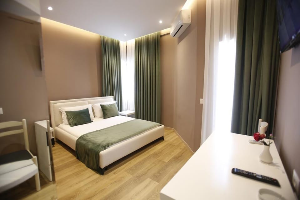 Deluxe Double Room, Balcony, City View | Down comforters, minibar, soundproofing, iron/ironing board
