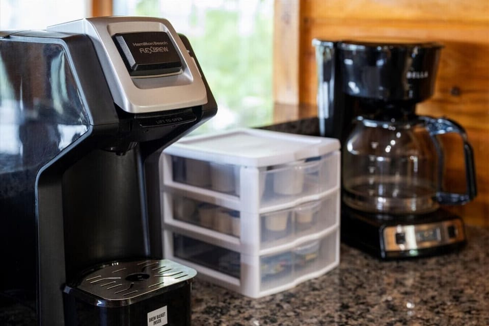From single-serve pods to full carafes, the coffee station has you covered—just steps from the window, where the sunlight pours in and the mountain views are always brewing.