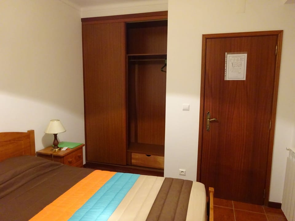Economy Double Room, 1 Double Bed, Private Bathroom, Hill View | Blackout drapes
