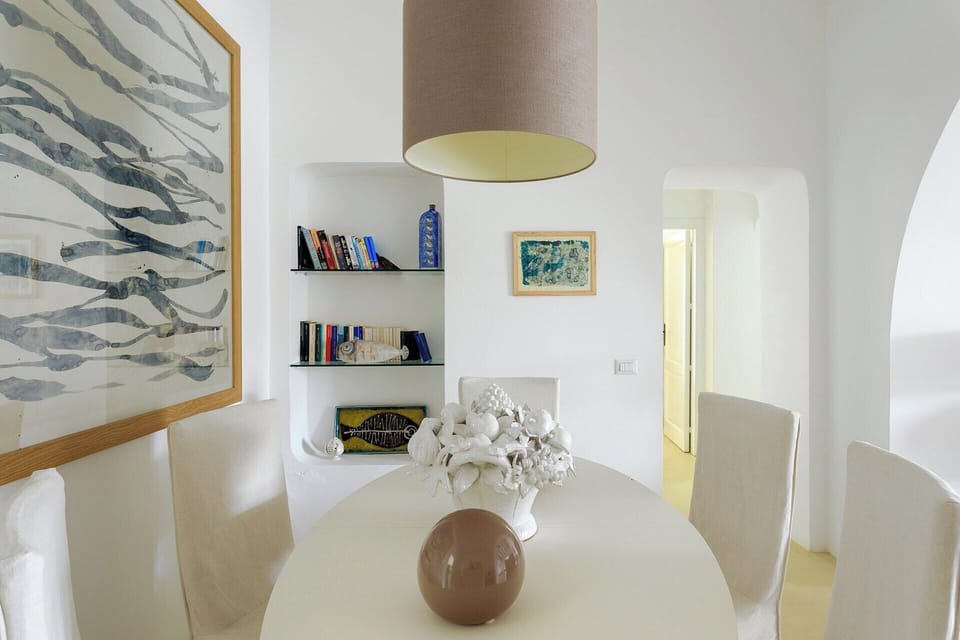 The indoor dining area is an extension of the living room.