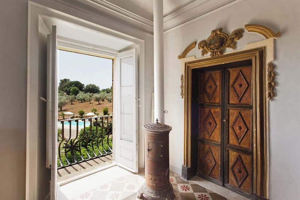 The main bedroom also looks out towards the swimming pool.
