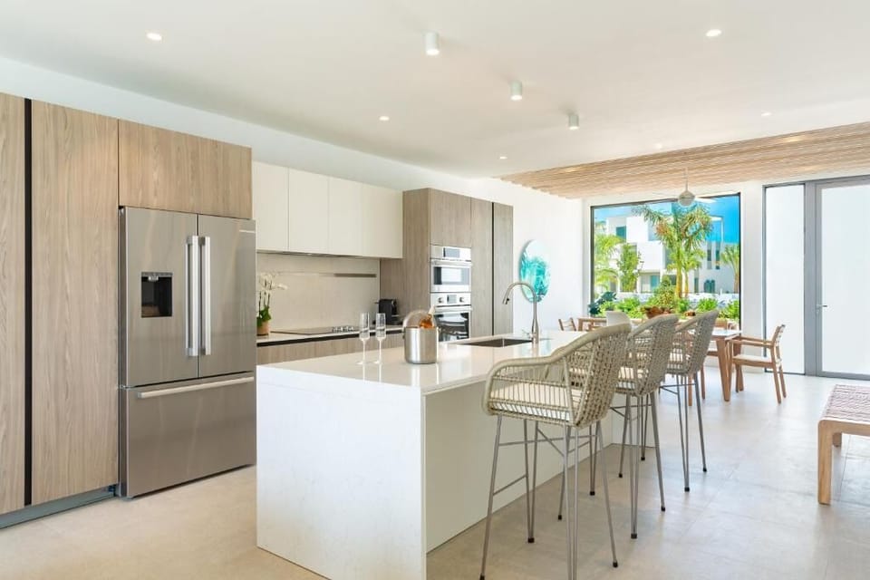 Cook effortlessly with a chef-ready island and sleek modern appliances.