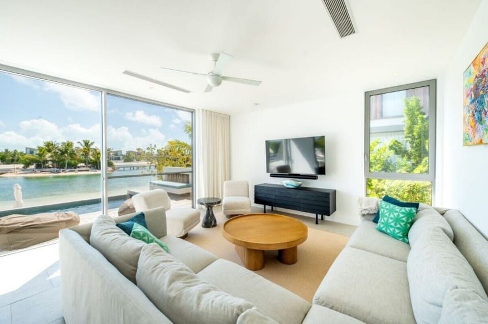 Unwind on the spacious sectional with panoramic water scenery.