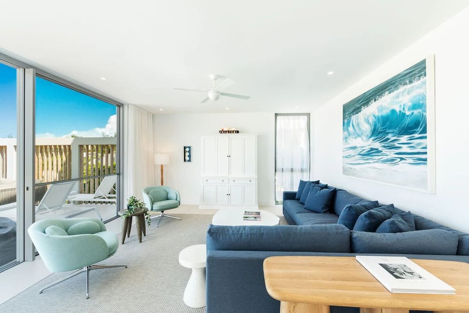 Stretch out on deep sofas after a sun-soaked day
