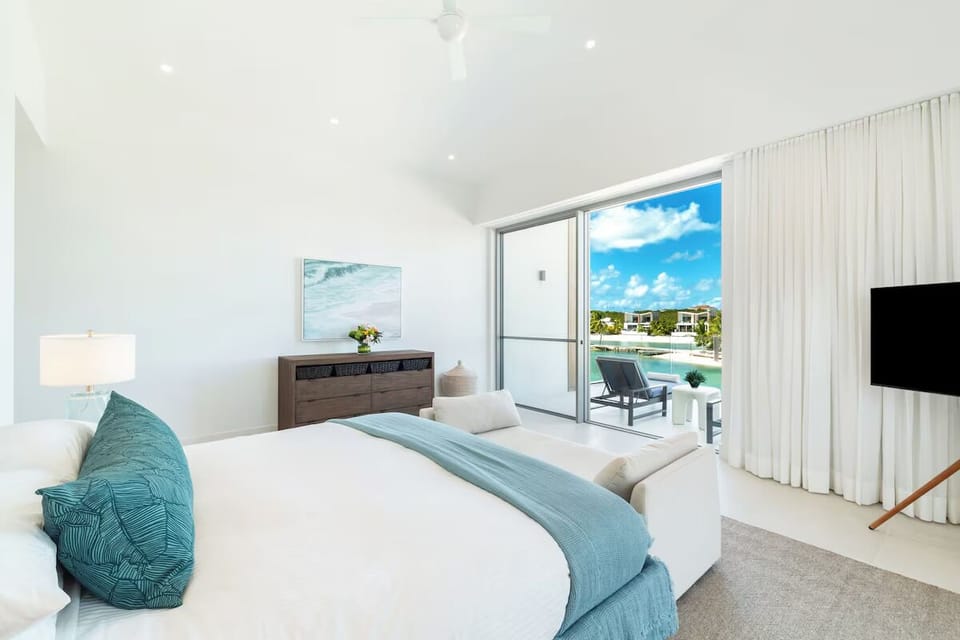 Unwind in a bright suite with doors to the terrace