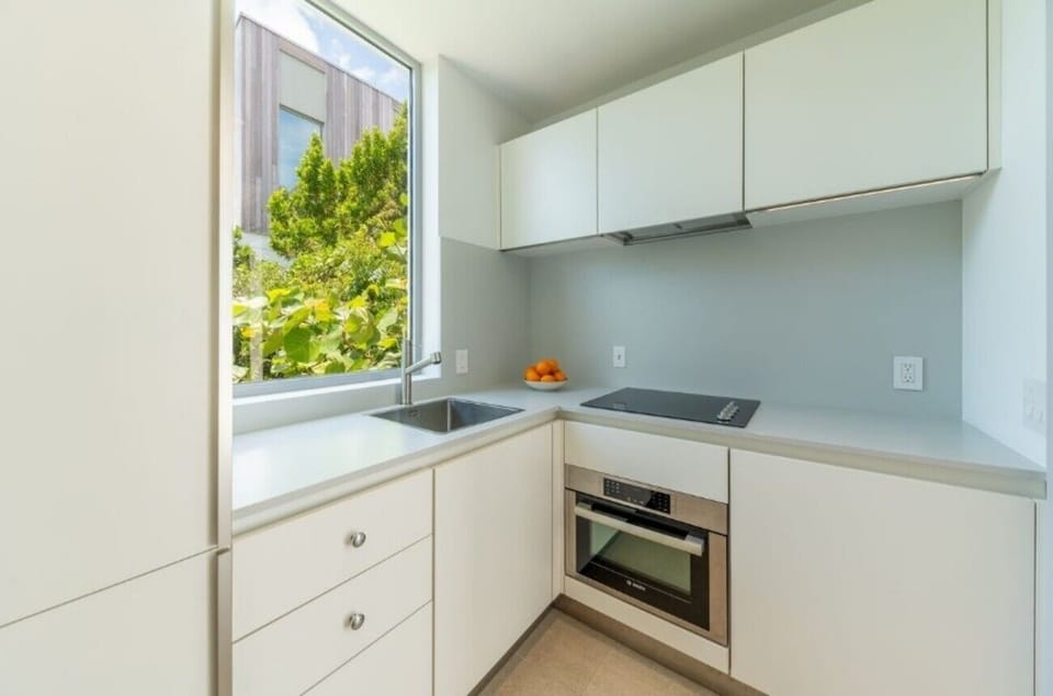 Whip up quick snacks in the bright, minimalist kitchenette.