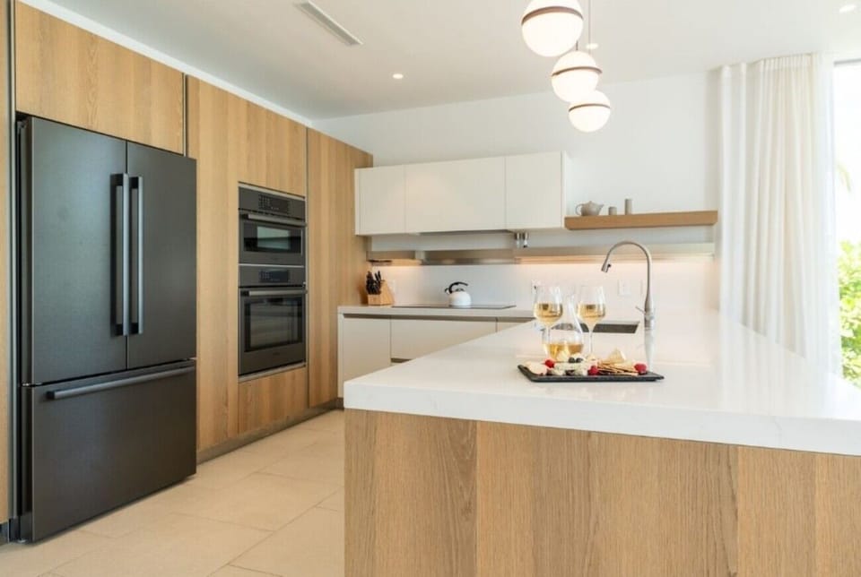 Create fresh breakfasts on the sleek island with modern appliances.