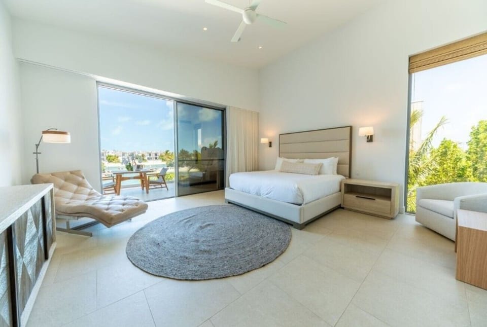 Wake up to soft daylight and breezy indoor-outdoor lounging.