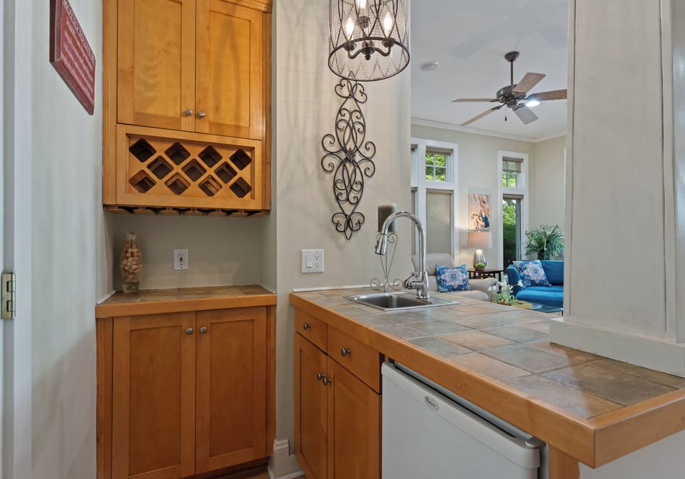 Wet bar off kitchen and sitting room.