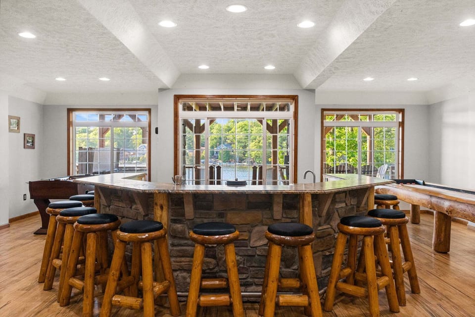 Belly up to the Custom Bar in the 1st Floor Game Room for some drinks and good times
