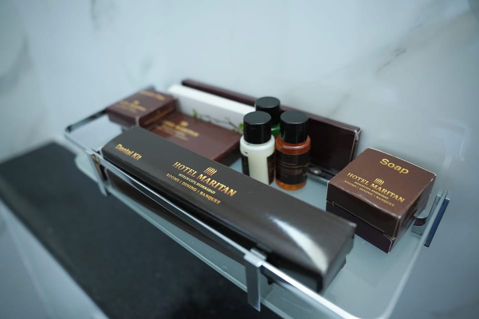 Shower, free toiletries, hair dryer, slippers