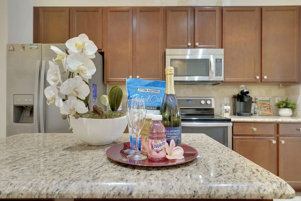 Open, bright, and ready to serve—our kitchen is basically an invitation to gather, laugh, and eat your way through vacation.