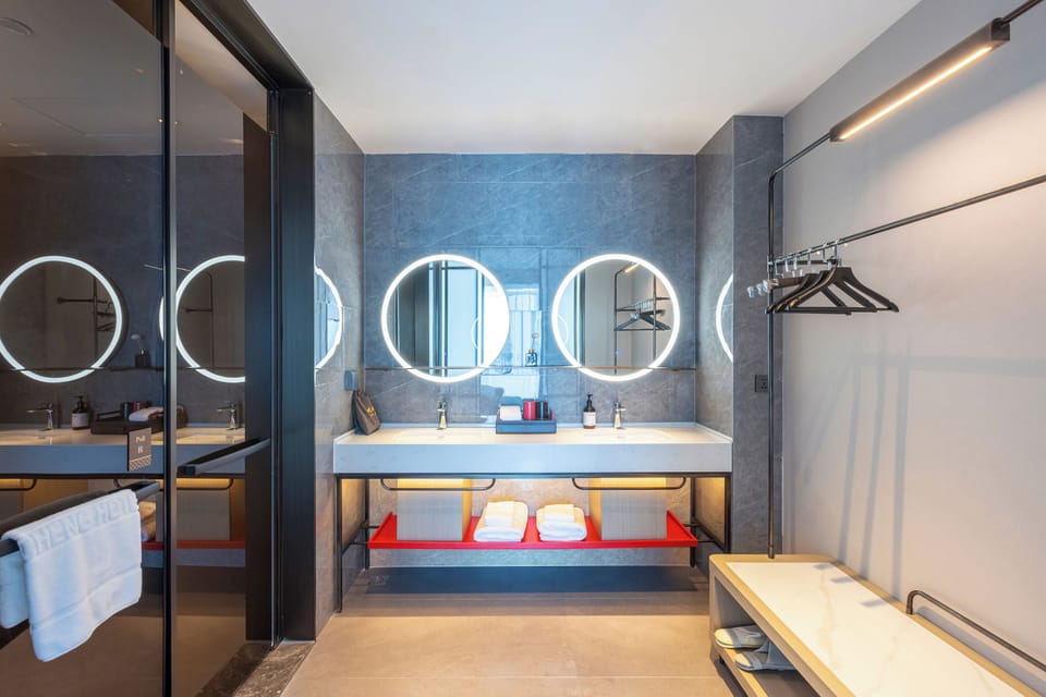 Executive Suite, City View | Bathroom | Shower, rainfall showerhead, designer toiletries, hair dryer