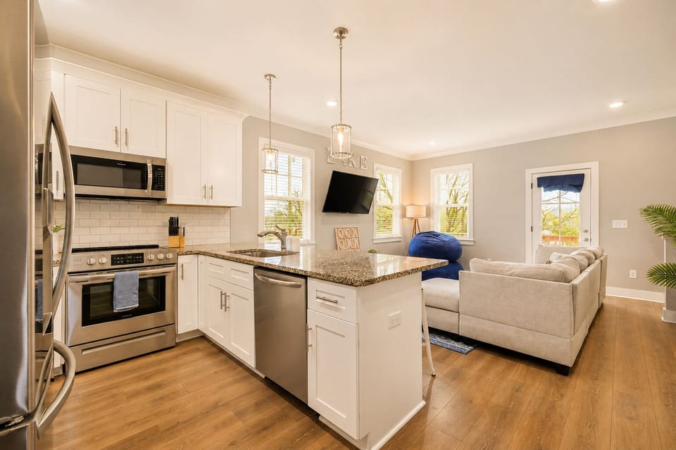 Open-concept kitchen keeps cooking and conversation together