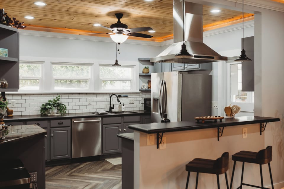 Full Kitchen with all the necessities! Dishwasher and professional hood fan. Mid-Century Design meets Craftsman comfort. 🍽️