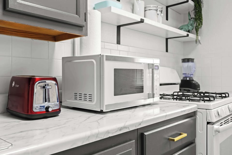 Kitchen: Bright and functional, this kitchen makes cooking a breeze during your stay