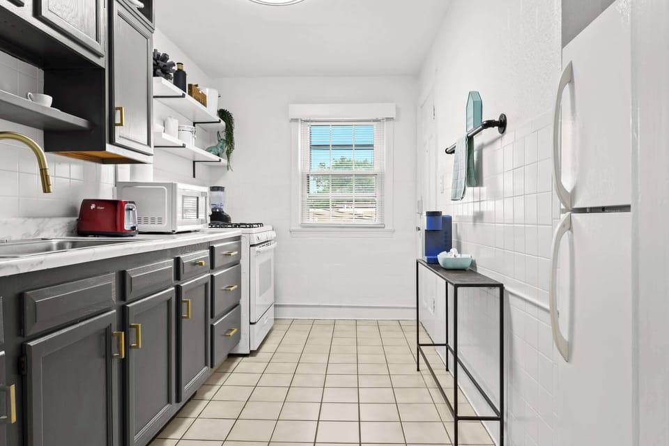 Kitchen: Bright and functional, this kitchen makes cooking a breeze during your stay