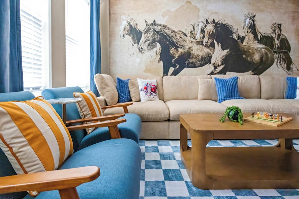 Living Room: Modern Comfort, Timeless Warmth – Thoughtfully designed with plush seating, natural light, and calming tones, this space is the heart of your stay.