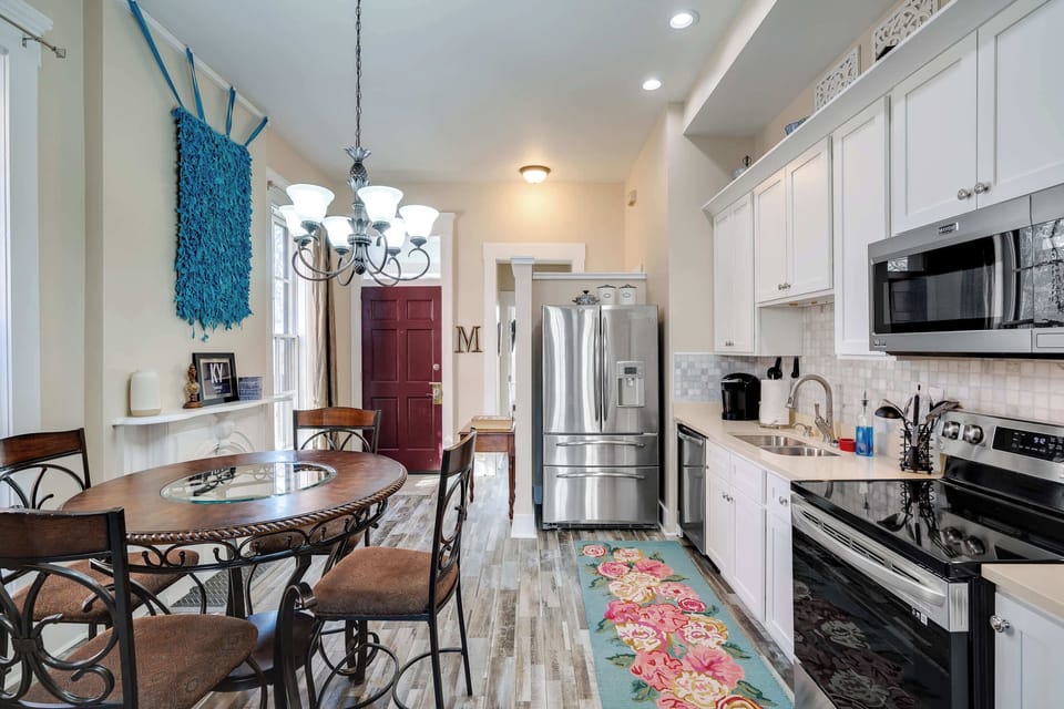 Kitchen: Functional kitchen with essential appliances and cookware.