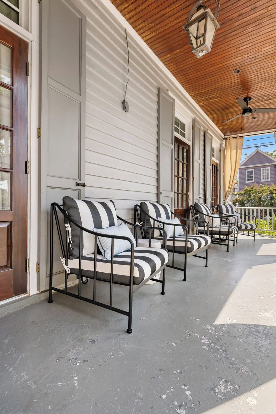Spacious shared porch w/ seating!