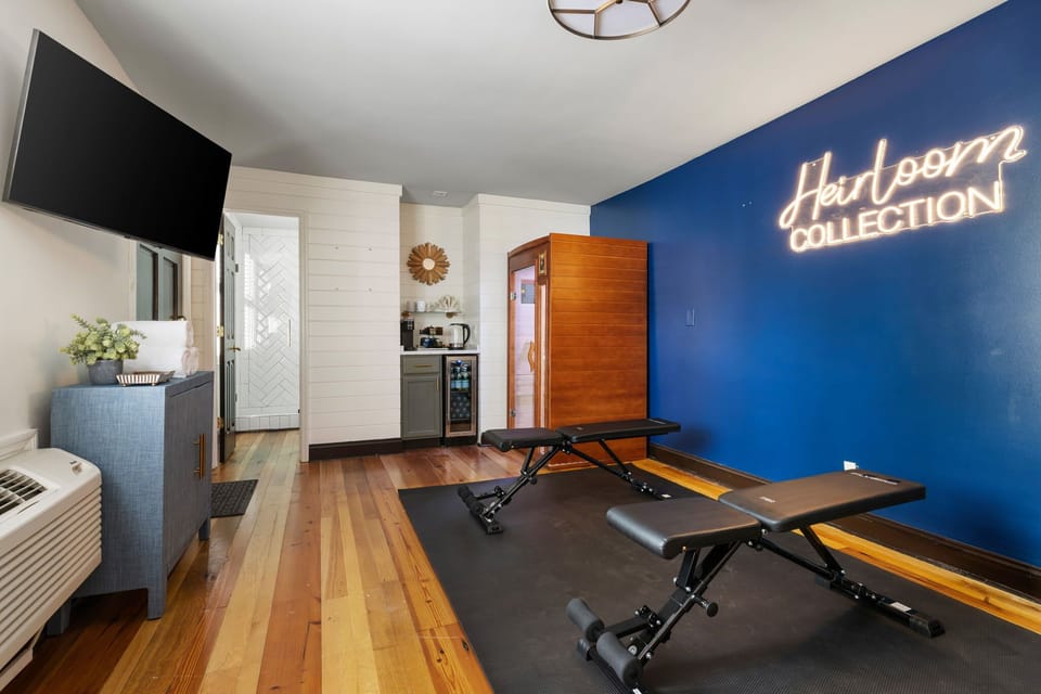 Recharge in your shared wellness retreat, complete with a gym and infrared sauna.