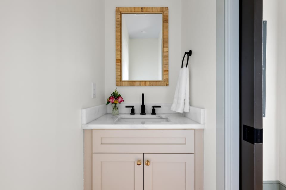 Well-appointed half bath with modern finishes.