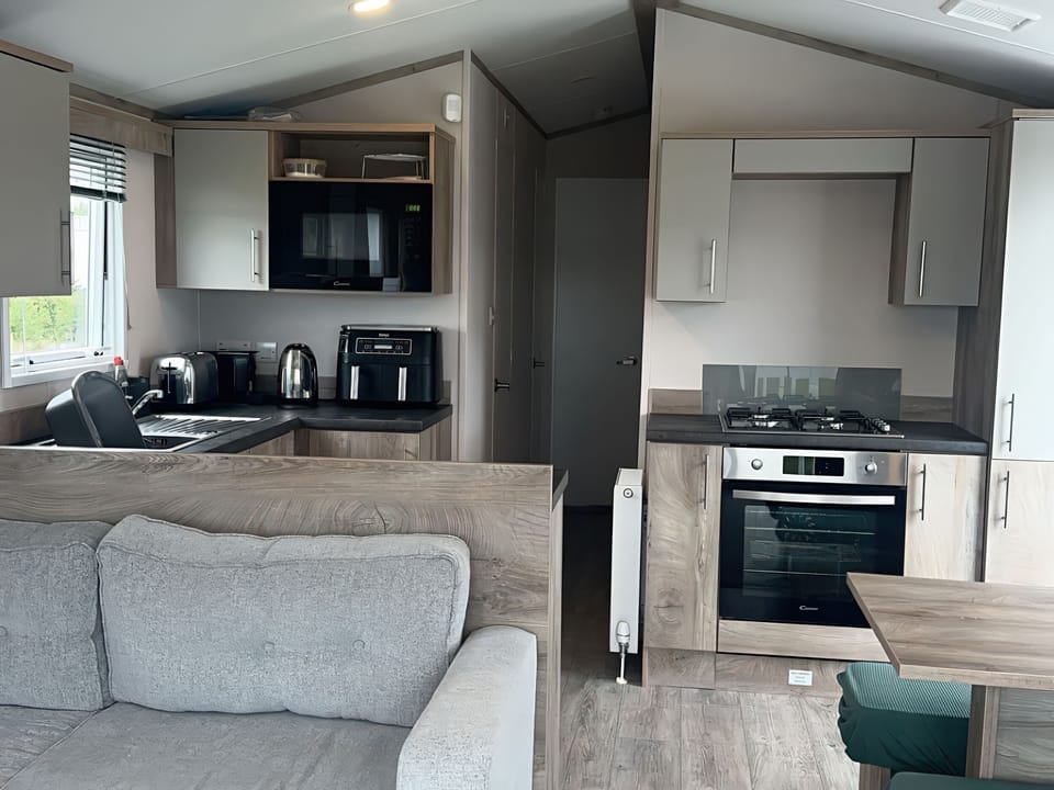 Fridge, microwave, toaster, cookware/dishes/utensils