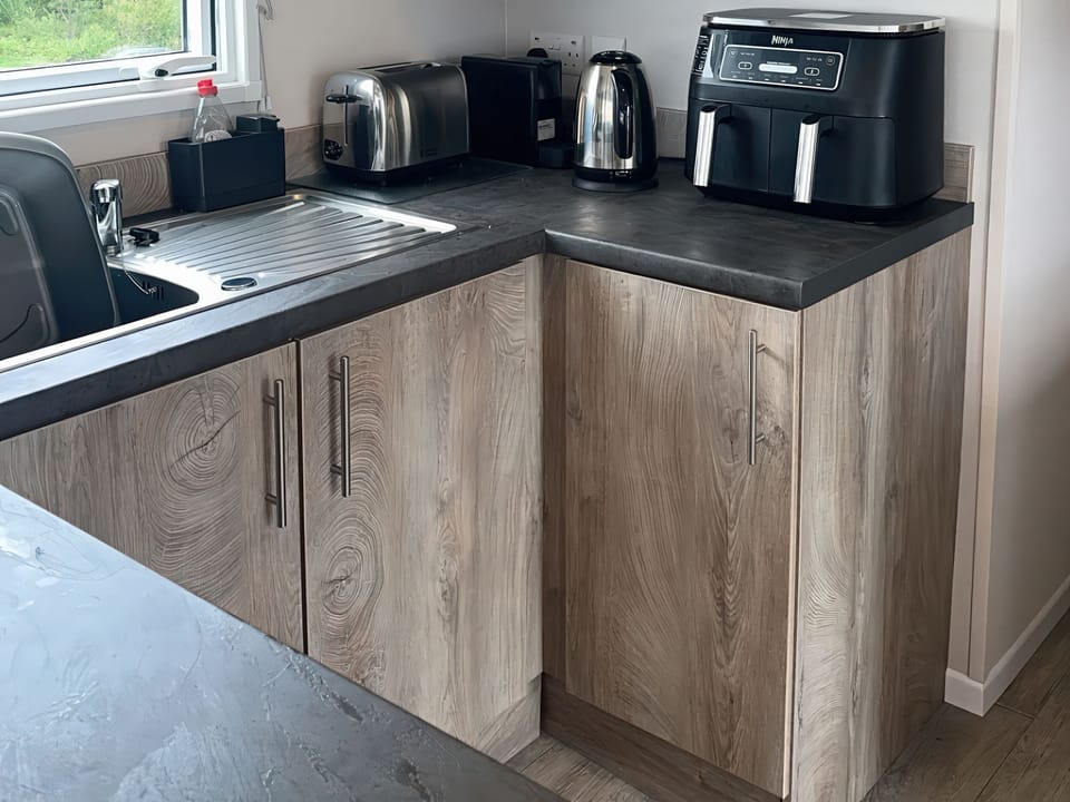 Fridge, microwave, toaster, cookware/dishes/utensils