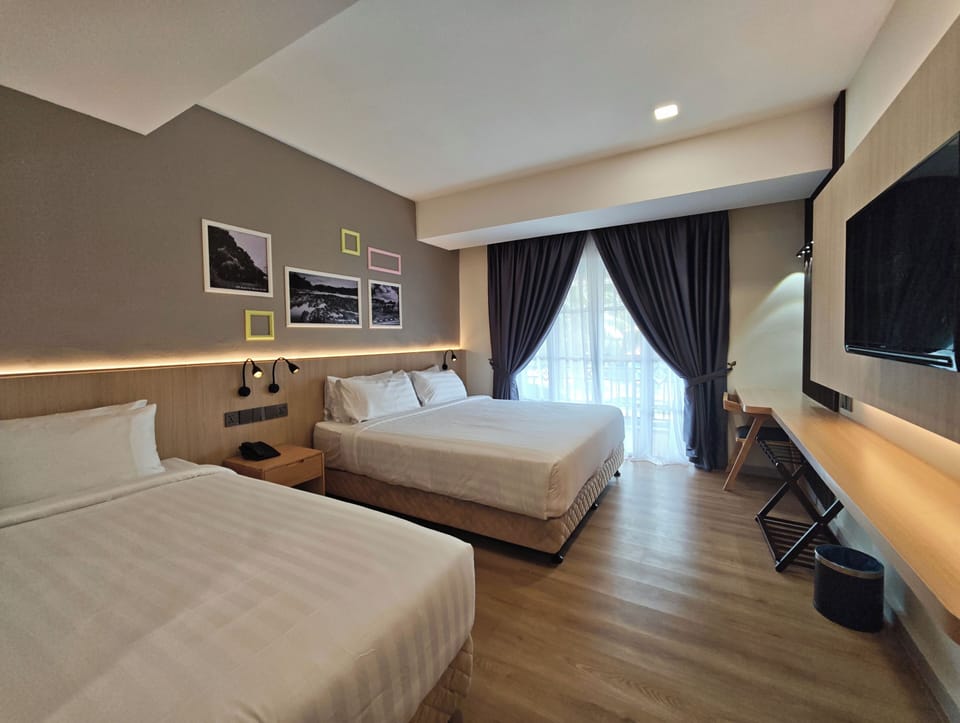 Family Room, Garden View | In-room safe, desk, laptop workspace, blackout drapes