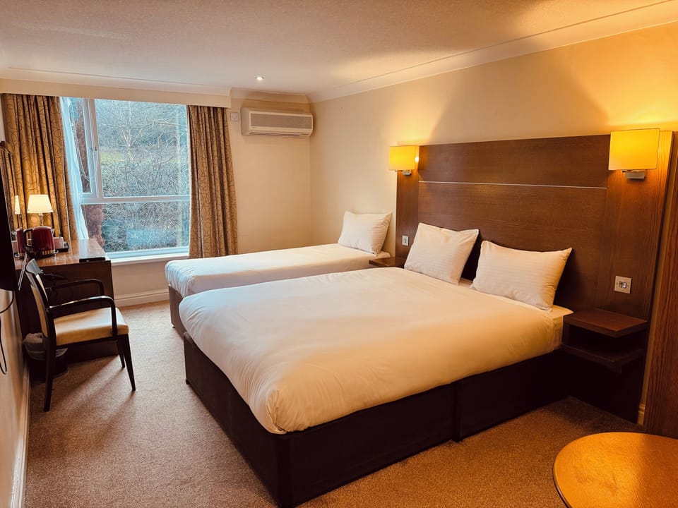 Family Room | Desk, iron/ironing board, free WiFi, bed sheets